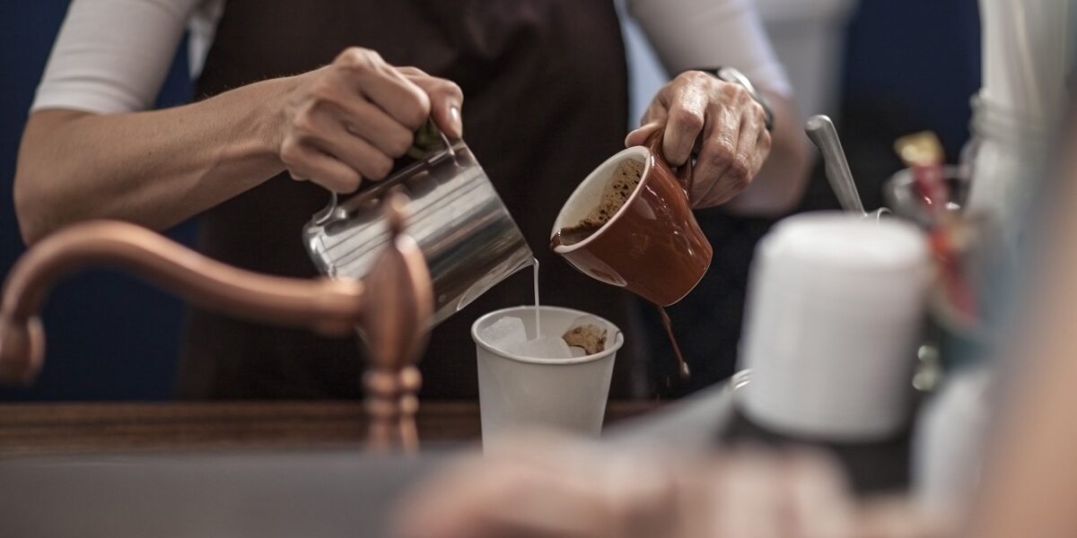 Barista preparing iced coffee